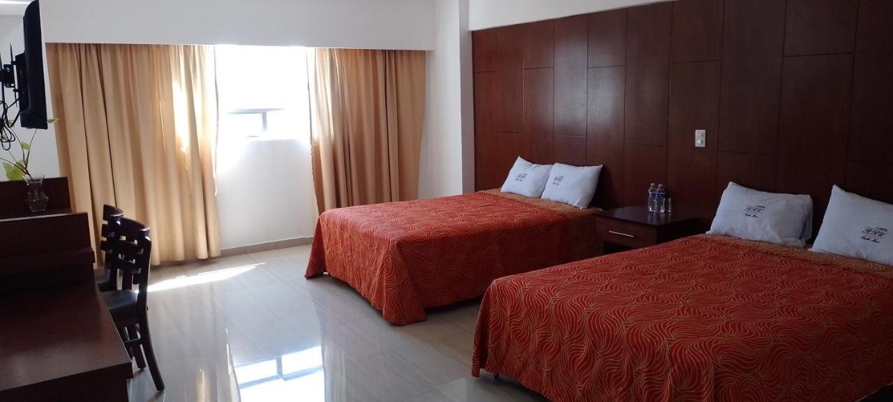 Hotel Rru Puebla Bagian luar foto